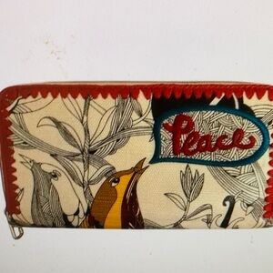 Sakroots Peace embroidered bird & botanical coated canvas zip around wallet